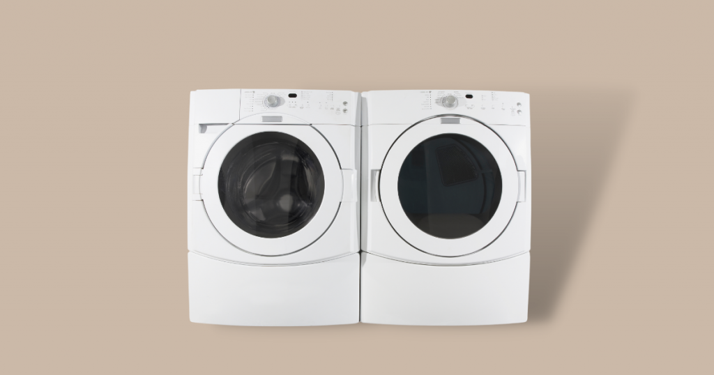 2 front load washer against brown background
