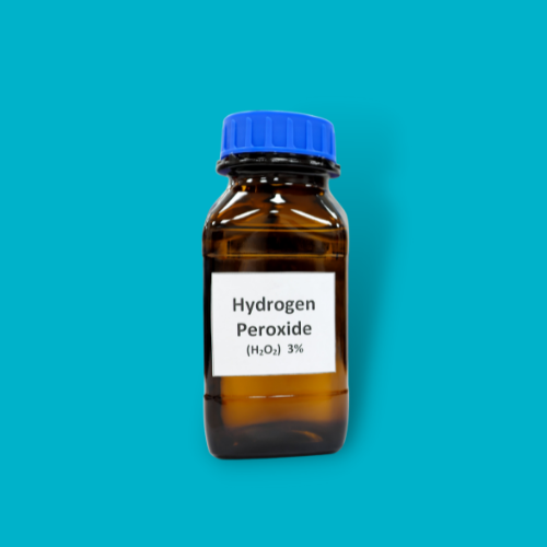 bottle of hydrogen peroxide against blue background
