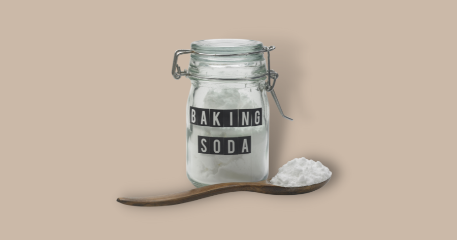 baking soda in a mason jar and a spoonful of baking soda