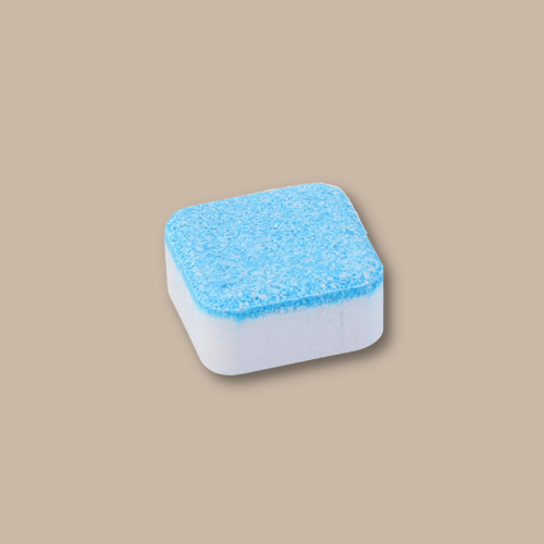 color white rectangular cleaning tablet that has blue shade on top