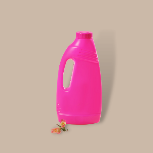 pink stain remover bottle against brown background