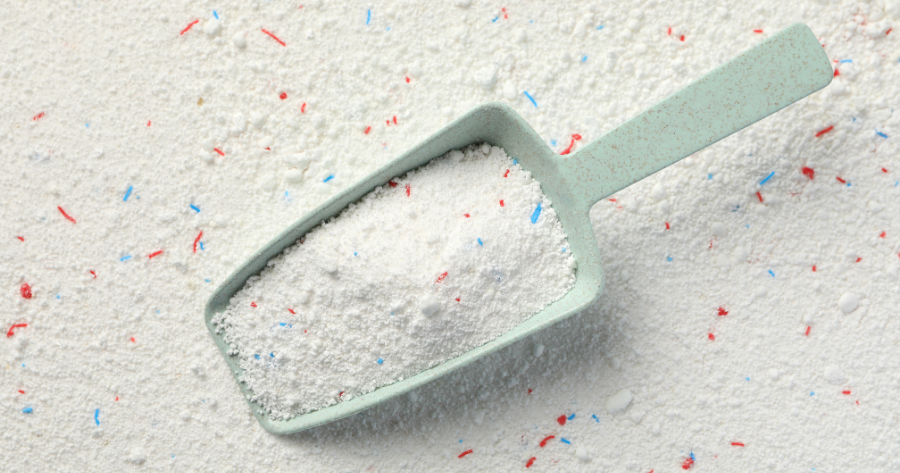 a scoop of powder laundry detergent
