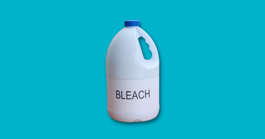bottle of bleach against blue background