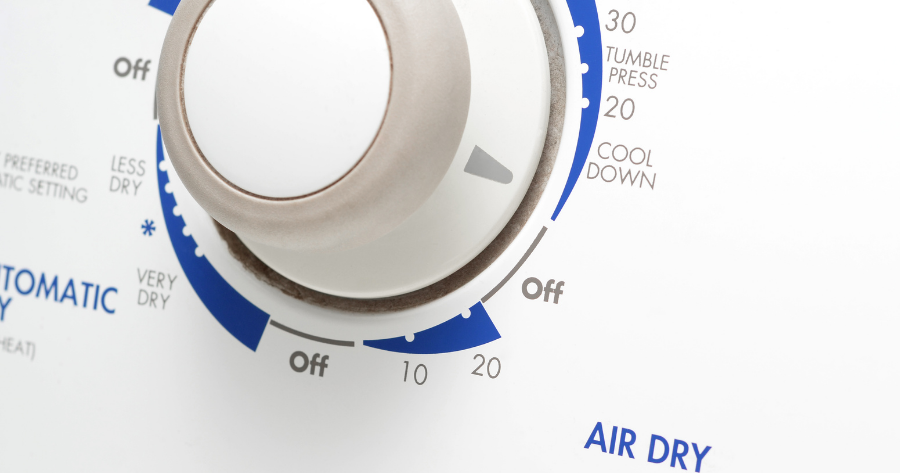 close up of the dial of a clothes dryer