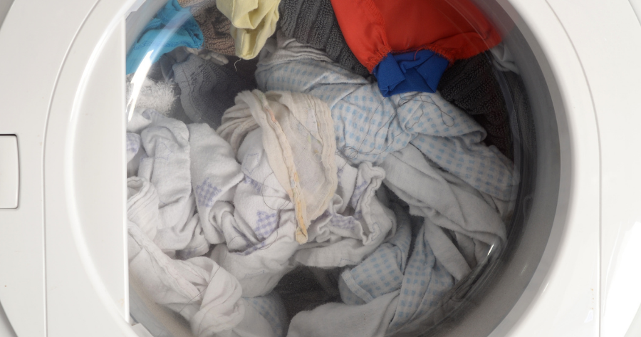 front view of a dryer full of clothes