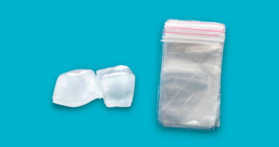 ice cubes and ziplock bags against blue background